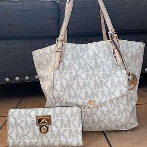 Very spacious Michael Kors bag.